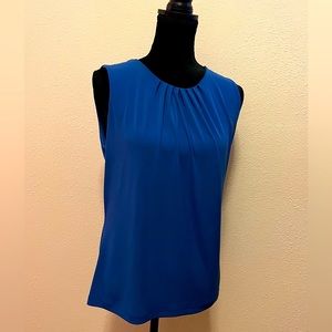 Calvin Klein sleeveless blouse.